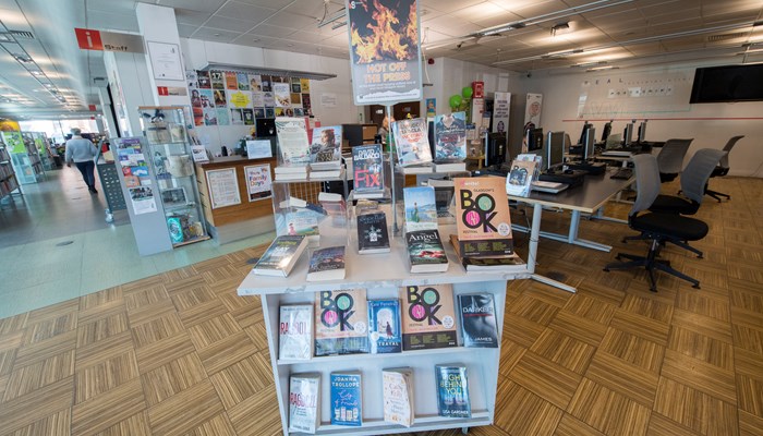 A freestanding book display in Gorbals Library.