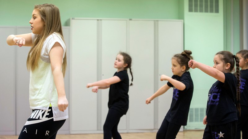 Girls dancing with instructor witacres