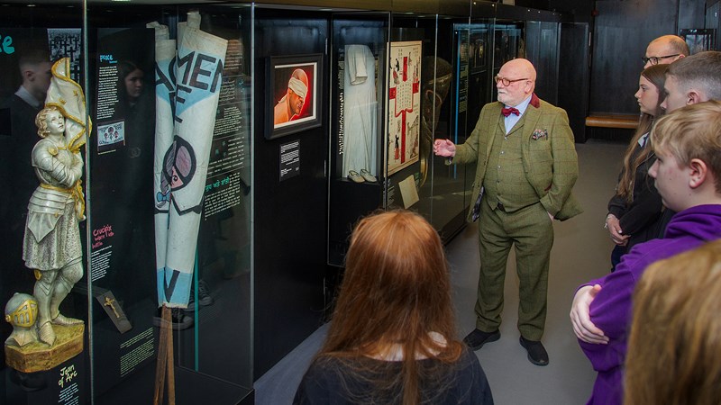 Photograph shows school pupils learning about the Holocaust.