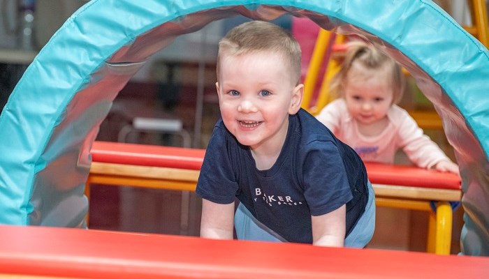 A child playing during a gymnastics session