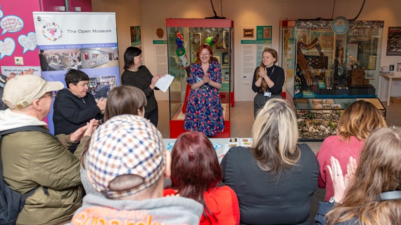 Photographs showing The Open Museum in action in a local community centre.